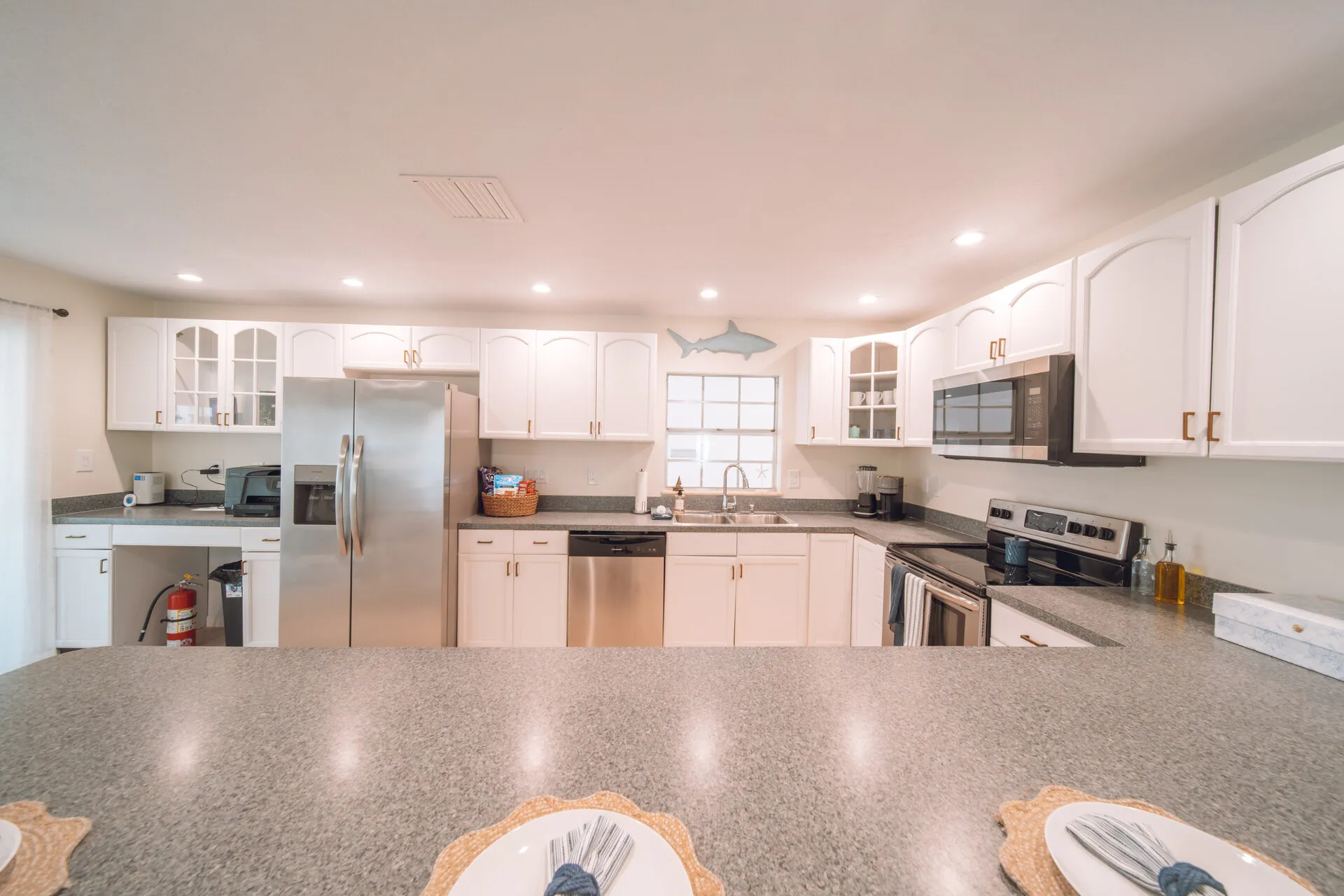 Full kitchen inside the Compass Boat Club waterfront pool house